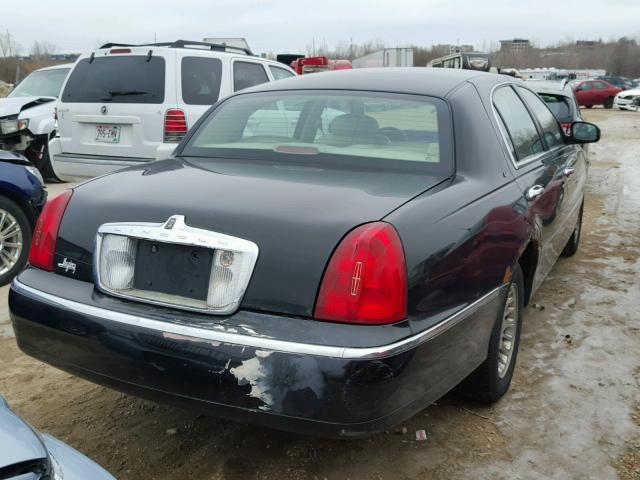 1LNHM83W9YY940117 - 2000 LINCOLN TOWN CAR C BLACK photo 4