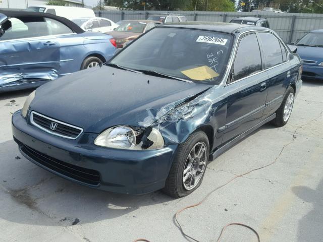 JHMEJ6575VS008066 - 1997 HONDA CIVIC LX GREEN photo 2