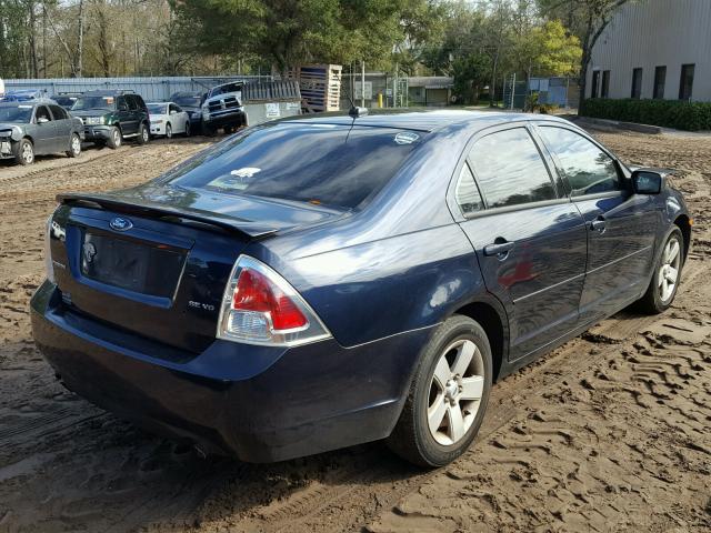 3FAHP07129R104506 - 2009 FORD FUSION SE BLUE photo 4