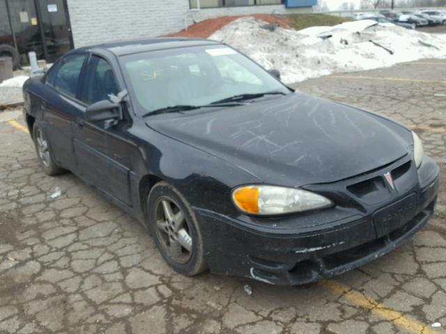 1G2NV52E61C129605 - 2001 PONTIAC GRAND AM G BLACK photo 1