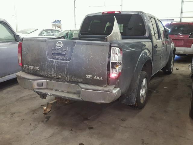 1N6AD07W06C412331 - 2006 NISSAN FRONTIER C SILVER photo 4