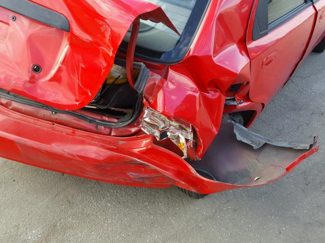 KL1TD52625B476026 - 2005 CHEVROLET AVEO BASE Czerwony zdjęcie 10