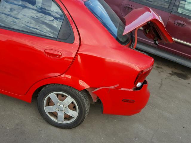 KL1TD52625B476026 - 2005 CHEVROLET AVEO BASE Czerwony zdjęcie 9