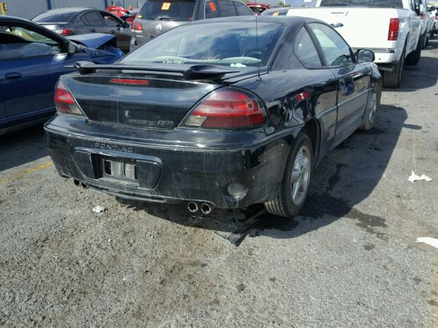 1G2NW12E6YM760588 - 2000 PONTIAC GRAND AM G BLACK photo 4