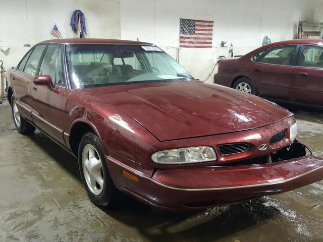 1G3HN52K1X4820607 - 1999 OLDSMOBILE 88 BASE BURGUNDY photo 1