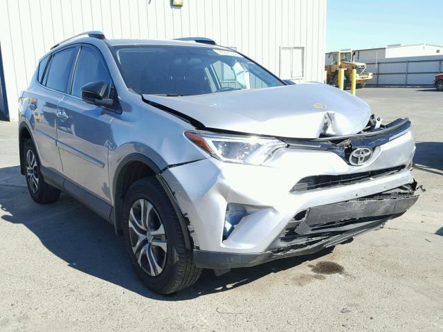 2T3ZFREV8GW275507 - 2016 TOYOTA RAV4 LE SILVER photo 1