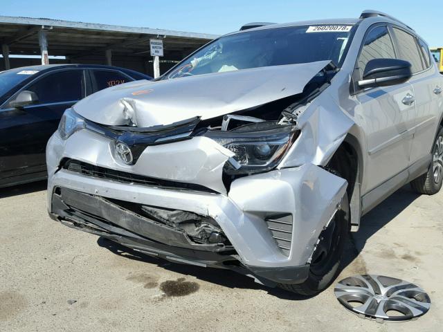 2T3ZFREV8GW275507 - 2016 TOYOTA RAV4 LE SILVER photo 9