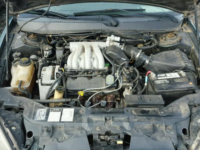 1FAFP5227YG231357 - 2000 FORD TAURUS LX GREEN photo 7