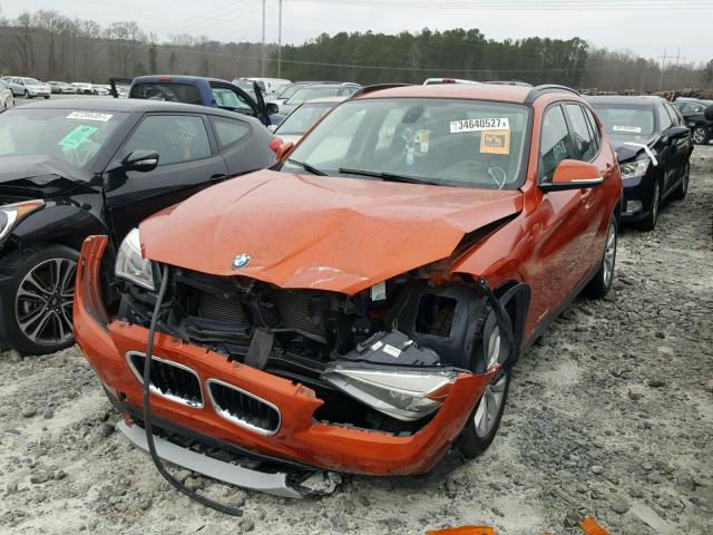 WBAVL1C51EVY19116 - 2014 BMW X1 XDRIVE2 ORANGE photo 2