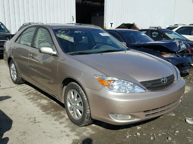 JTDBF30K030150348 - 2003 TOYOTA CAMRY LE TAN photo 1