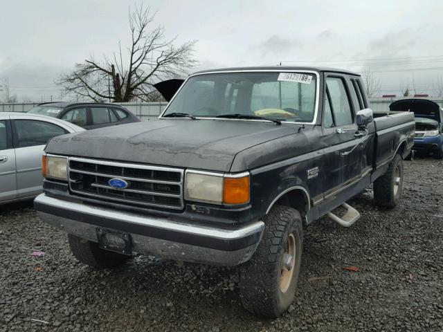 1FTHX26G4LKB10136 - 1990 FORD F250 BLACK photo 2