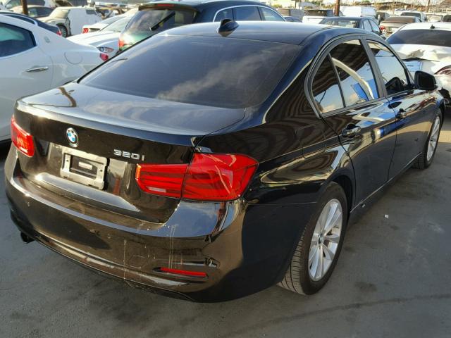 WBA8E1G52HNU12931 - 2017 BMW 320 I BLACK photo 4