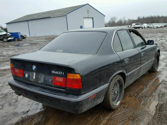 WBAHE6319RGF25624 - 1994 BMW 540 I AUTO BLACK photo 4