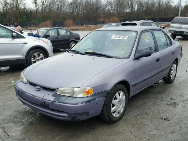 1Y1SK5288WZ413576 - 1998 CHEVROLET GEO PRIZM GRAY photo 2