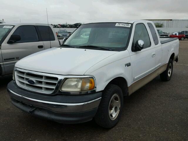 1FTZX1722XKB20560 - 1999 FORD F150 WHITE photo 2