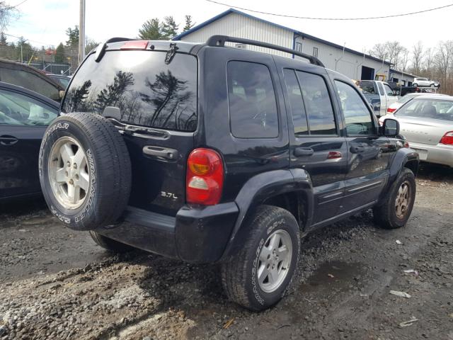 1J4GL58K52W285166 - 2002 JEEP LIBERTY LI BLACK photo 4