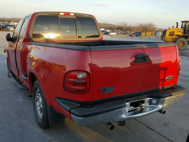 1FTRX07L2YKB07411 - 2000 FORD F150 RED photo 3