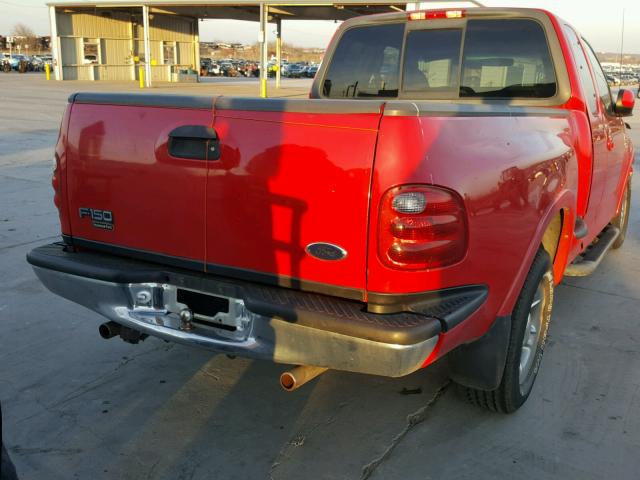 1FTRX07L2YKB07411 - 2000 FORD F150 RED photo 4