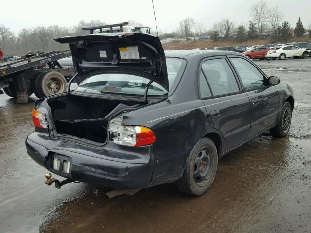 1Y1SK528X2Z422483 - 2002 CHEVROLET GEO PRIZM BLACK photo 4