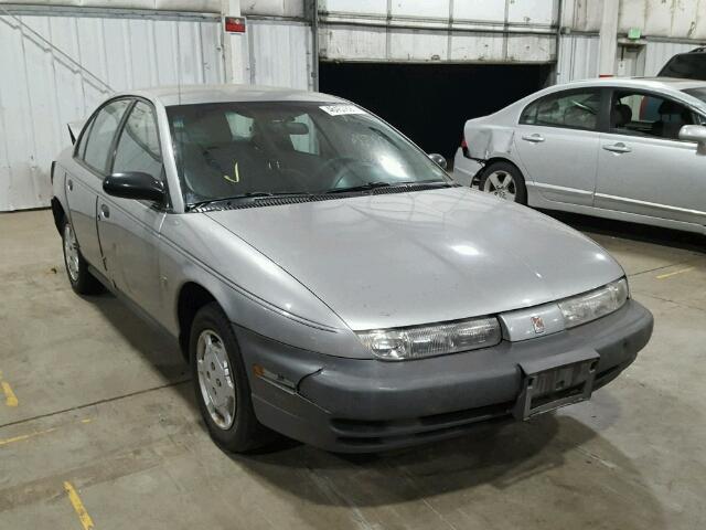 1G8ZG5287XZ110806 - 1999 SATURN SL1 GRAY photo 1