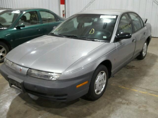 1G8ZG5287XZ110806 - 1999 SATURN SL1 GRAY photo 2