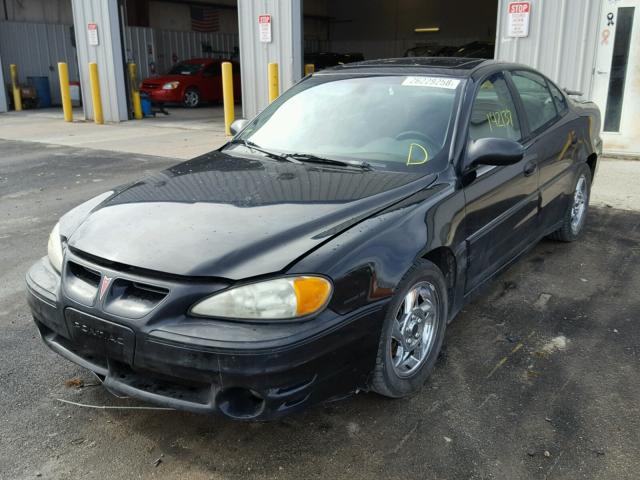 1G2NW52E02M630482 - 2002 PONTIAC GRAND AM G BLACK photo 2