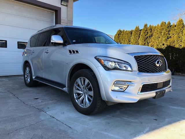 JN8AZ2NF2G9612039 - 2016 INFINITI QX80 SILVER photo 4