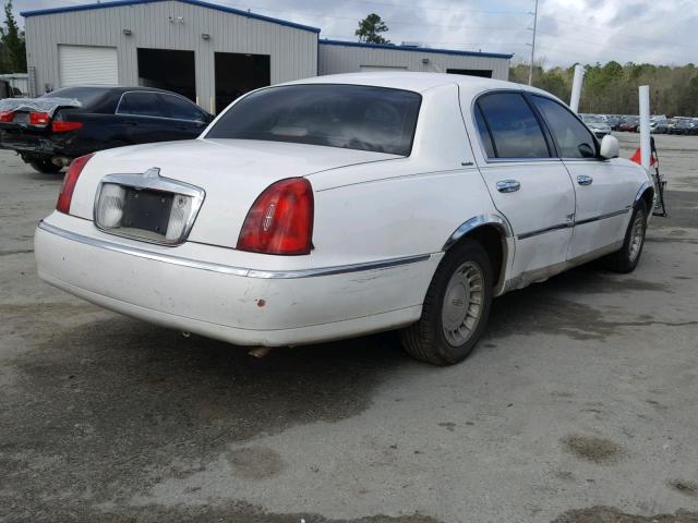 1LNHM81W3XY706041 - 1999 LINCOLN TOWN CAR E WHITE photo 4