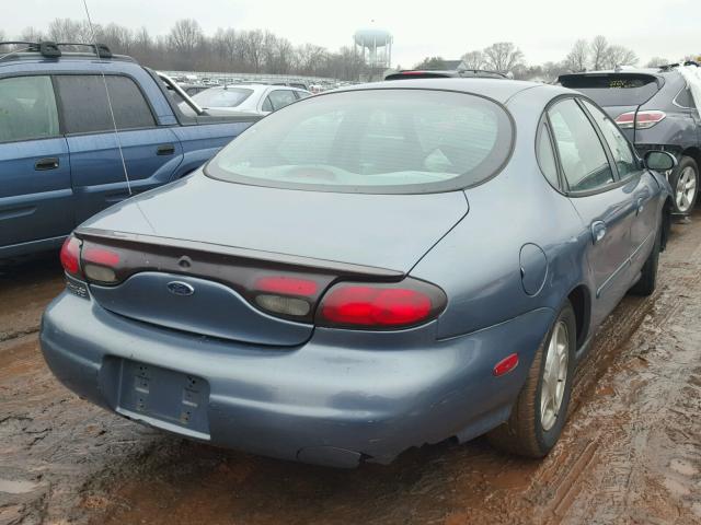 1FAFP53UXXG285217 - 1999 FORD TAURUS SE BLUE photo 4