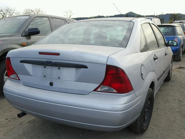 1FAFP33Z03W240531 - 2003 FORD FOCUS LX SILVER photo 4