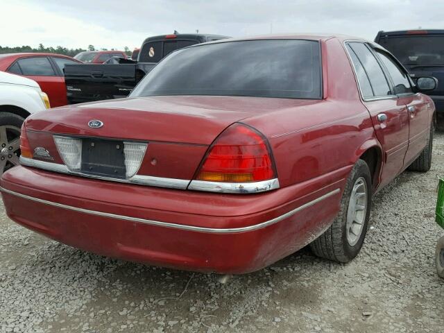 2FAFP74W3YX211077 - 2000 FORD CROWN VICT RED photo 4