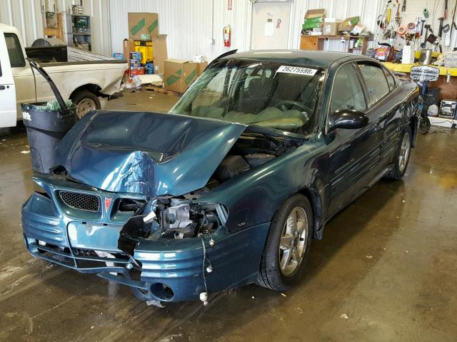 1G2NF52E82M623036 - 2002 PONTIAC GRAND AM S GREEN photo 2