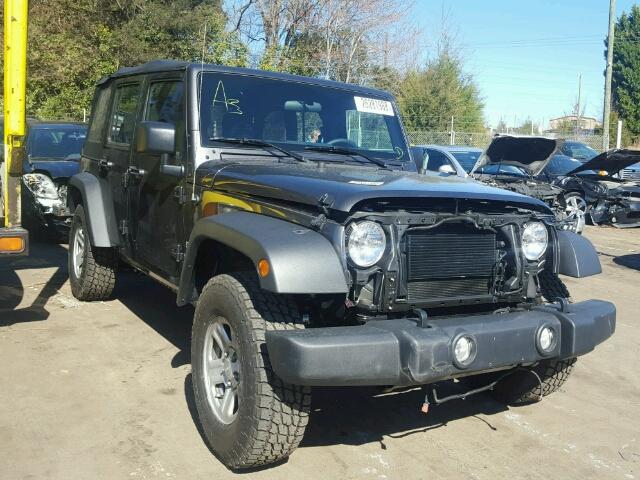 1C4BJWDG6JL829557 - 2018 JEEP WRANGLER U GRAY photo 1