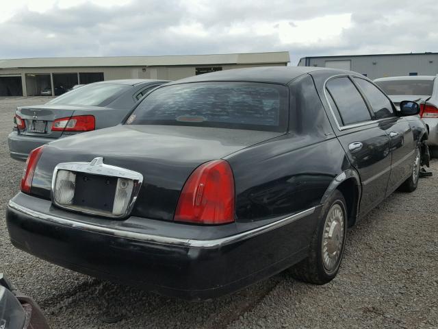 1LNHM82W22Y658510 - 2002 LINCOLN TOWN CAR S BLACK photo 4