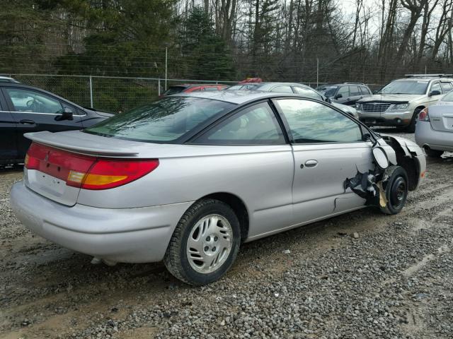 1G8ZY1279YZ109008 - 2000 SATURN SC2 SILVER photo 4