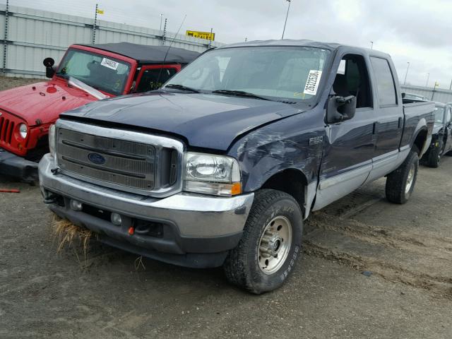 1FTSW31F62EC40610 - 2002 FORD F350 SRW S BLUE photo 2