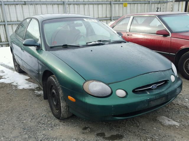 1FAFP53S2XG132409 - 1999 FORD TAURUS SE GREEN photo 1