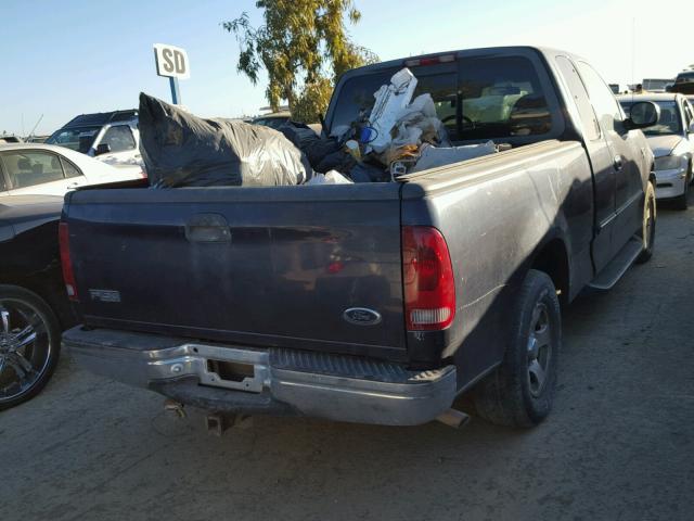 1FTRX17LXXKB73399 - 1999 FORD F150 BLUE photo 4