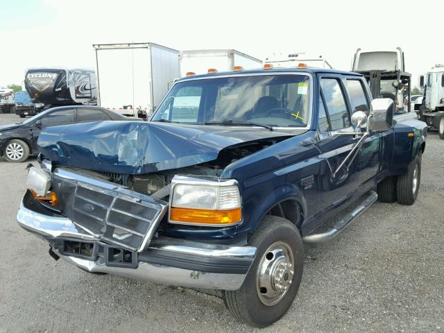 1FTJW35F9VEA95136 - 1997 FORD F350 GREEN photo 2