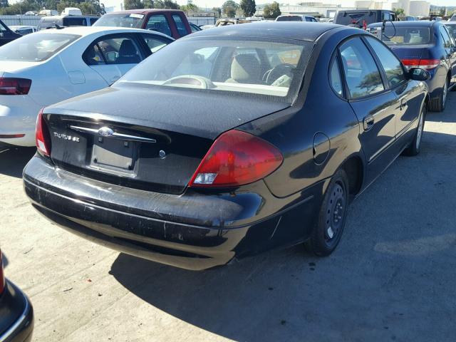 1FAFP53U5YG105062 - 2000 FORD TAURUS SE BLACK photo 4