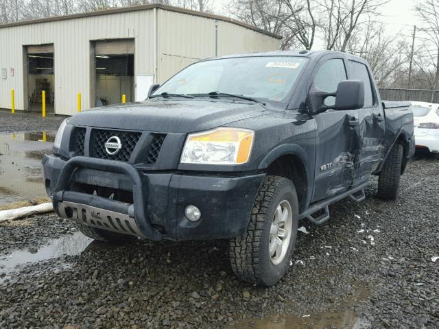 1N6AA0EC9BN308887 - 2011 NISSAN TITAN S BLACK photo 2