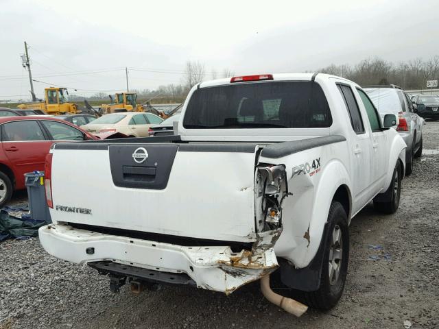 1N6AD07U59C425322 - 2009 NISSAN FRONTIER C WHITE photo 4