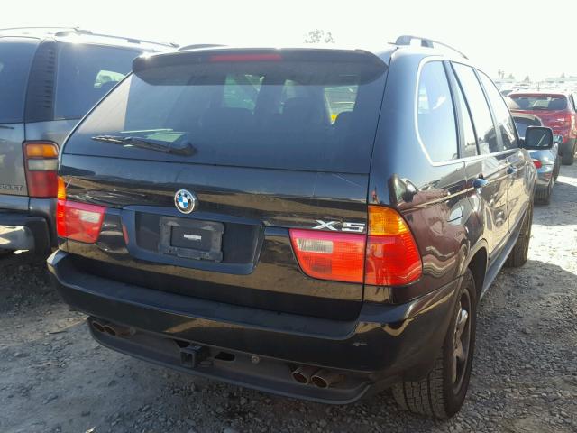 5UXFB33512LH38910 - 2002 BMW X5 4.4I BLACK photo 4