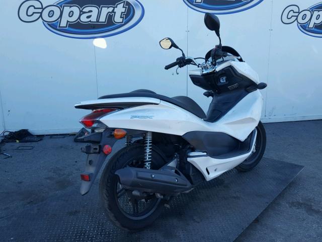 MLHJF2805B5000744 - 2011 HONDA PCX Blanc photo 4