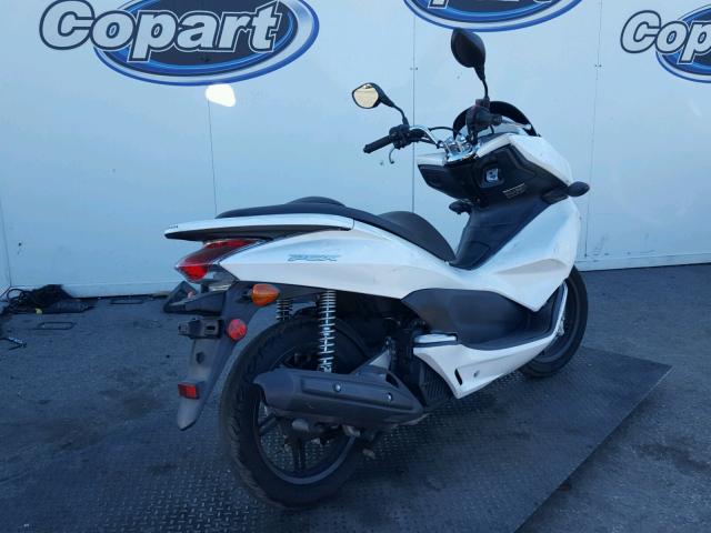 MLHJF2805B5000744 - 2011 HONDA PCX WHITE photo 4