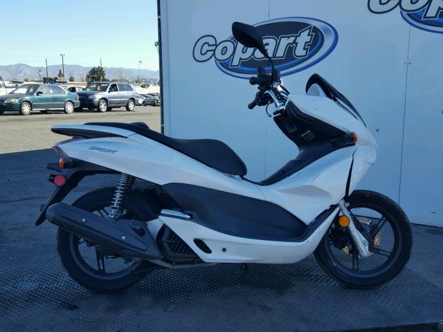 MLHJF2805B5000744 - 2011 HONDA PCX Blanc photo 9