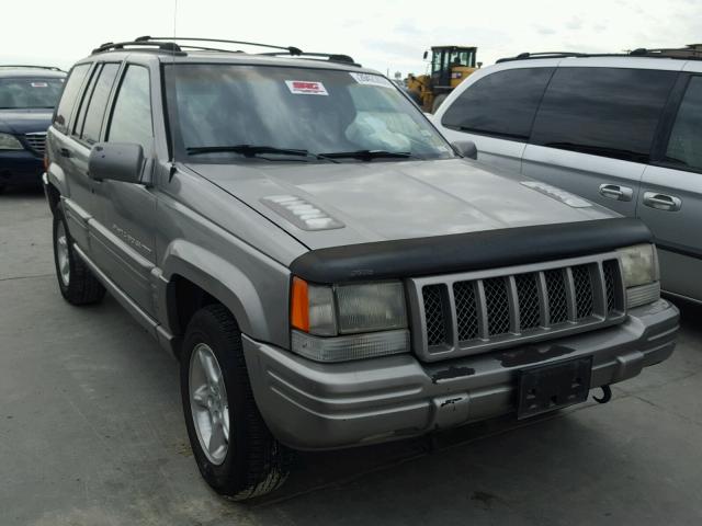 1J4GZ88Z8WC257995 - 1998 JEEP GRAND CHER SILVER photo 1