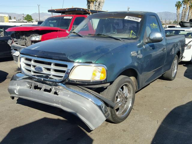 1FTZF1724XKA16929 - 1999 FORD F150 GREEN photo 2