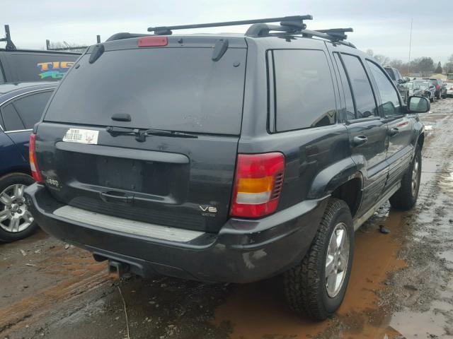 1J8GW68J43C552450 - 2003 JEEP GRAND CHER BLACK photo 4