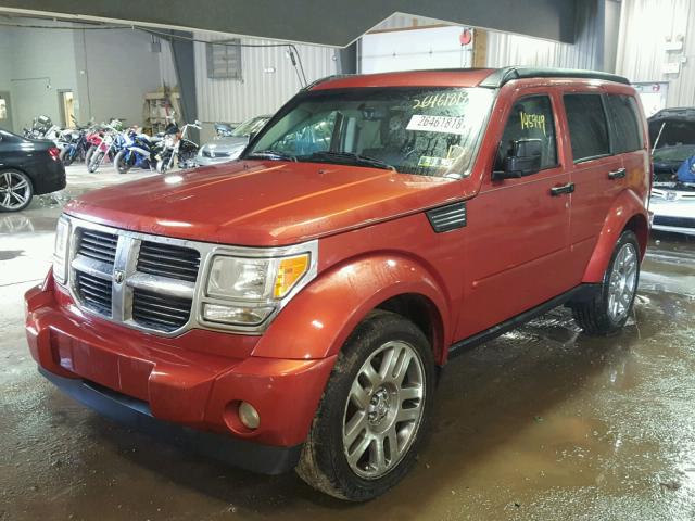 1D8GU58K57W674286 - 2007 DODGE NITRO SLT ORANGE photo 2